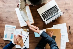 business-people-shaking-hands-together_53876-13391