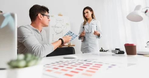confused-woman-looking-her-company-colleague_23-2148352747